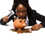 Beautiful african american woman with a piggybank
