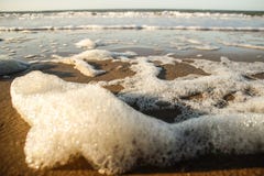 Beautiful airy pieces of sea foam white flakes stock photography Beautiful airy pieces of sea foam white flakes stock photography