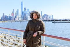 Beautiful american girl in area with Manhattan view stock photo Beautiful american girl in area with Manhattan view stock photo