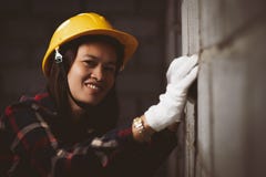 Asia woman working at the site works with happy. stock photo Asia woman working at the site works with happy. stock photo