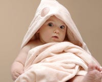 Beautiful Baby In A Pink Blanket Stock Image