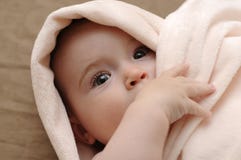Beautiful Baby In A Pink Blanket Royalty Free Stock Photo