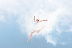 Beautiful ballet dancer jumping inside cloud of powder Royalty Free Stock Photo Beautiful ballet dancer jumping inside cloud of powder Royalty Free Stock Photo