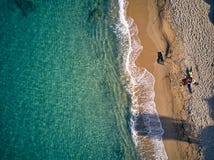 Beautiful beach with family top view shot stock photography Beautiful beach with family top view shot stock photography