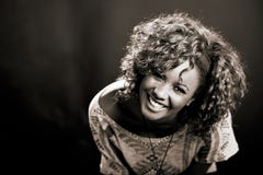 Beautiful Black Woman On Black Background. Studio Shot Stock Images