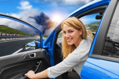 Beautiful Blonde Girl Driving A Car On The Highway. Invitation To Travel. Car Rental Or Vacation. Stock Photo