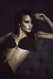 Beautiful Brunette Woman Vogue Style On Sofa royalty free stock images Beautiful Brunette Woman Vogue Style On Sofa royalty free stock images