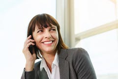 Beautiful business woman on professional phone call stock photo Beautiful business woman on professional phone call stock photo