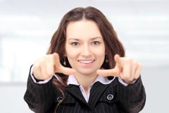 Beautiful businesswoman shows stock photo Beautiful businesswoman shows stock photo