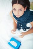 Beautiful caucasain woman is lying in bed and taking pill. stock images Beautiful caucasain woman is lying in bed and taking pill. stock images