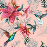 Beautiful colorful flying hummingbirds and red flowers on pink background. Exotic tropical seamless pattern. Watecolor painting.