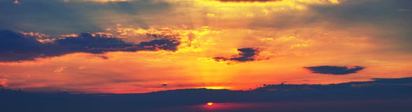 Beautiful colorful sunset sky background with the light of setting sun behind. stock photos Beautiful colorful sunset sky background with the light of setting sun behind. stock photos