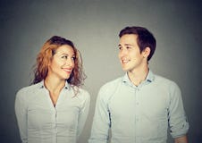 Beautiful couple is looking at each other and smiling Stock Photography Beautiful couple is looking at each other and smiling Stock Photography