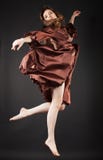 Beautiful Dancer Jumping On Dark Stock Photography