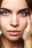Beautiful face of young woman. Skincare, wellness, spa. Clean soft skin, healthy fresh look. Natural daily makeup royalty free stock image Beautiful face of young woman. Skincare, wellness, spa. Clean soft skin, healthy fresh look. Natural daily makeup royalty free stock image
