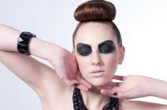 Beautiful fashion model with black make-up Stock Image Beautiful fashion model with black make-up Stock Image