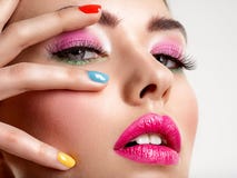 Beautiful fashion woman with a colored nails. Attractive white girl with multicolor manicure royalty free stock photo Beautiful fashion woman with a colored nails. Attractive white girl with multicolor manicure royalty free stock photo