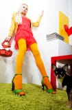 Beautiful female blonde fashion model with puppy Royalty Free Stock Photography Beautiful female blonde fashion model with puppy Royalty Free Stock Photography