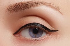 Beautiful female eye with black liner make-up royalty free stock photos Beautiful female eye with black liner make-up royalty free stock photos