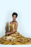Beautiful girl in golden dress