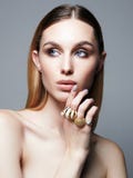Beautiful girl with jewelry on her hand royalty free stock images Beautiful girl with jewelry on her hand royalty free stock images