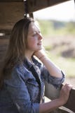 Beautiful girl looks out the window royalty free stock photos Beautiful girl looks out the window royalty free stock photos