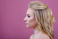 Beautiful girl portrait on a pink background. stock photo Beautiful girl portrait on a pink background. stock photo