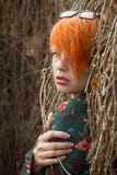 Beautiful girl with short red hair. royalty free stock images Beautiful girl with short red hair. royalty free stock images