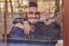 https://thumbs.dreamstime.com/t/beautiful-girl-sitting-her-boyfriend-s-lap-cafe-behind-window-romantic-date-couple-love-131534285.jpg
