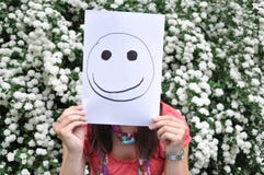 Beautiful Girl With A Sheet Of Paper Over Th Stock Photography Beautiful Girl With A Sheet Of Paper Over Th Stock Photography