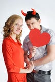 Beautiful Girl With Young Man With Red Horns Stock Photography Beautiful Girl With Young Man With Red Horns Stock Photography