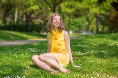 https://thumbs.dreamstime.com/t/beautiful-girl-yellow-dress-sitting-grass-41591740.jpg