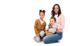 beautiful happy african american mother with adorable little kids smiling at camera royalty free stock photo beautiful happy african american mother with adorable little kids smiling at camera royalty free stock photo