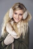 beautiful happy woman in a knitted jacket Stock Photos beautiful happy woman in a knitted jacket Stock Photos