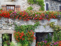 Beautiful House with Flowers in Yvoire, France stock photos Beautiful House with Flowers in Yvoire, France stock photos