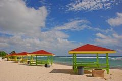 Beautiful huts with colourful roof and wooden structure along the coast of Grand Cayman island at Cayman Islands stock image Beautiful huts with colourful roof and wooden structure along the coast of Grand Cayman island at Cayman Islands stock image