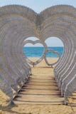 Beautiful installation of hearts on the beach of the ocean royalty free stock photos Beautiful installation of hearts on the beach of the ocean royalty free stock photos