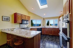 Beautiful kitchen room with skylight granite tile floor stock images Beautiful kitchen room with skylight granite tile floor stock images
