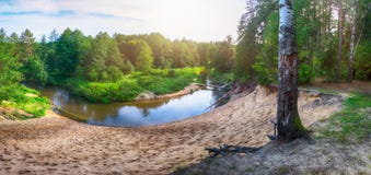 Beautiful Landscape of forest river with reflections of clouds and trees. Stock Photo Beautiful Landscape of forest river with reflections of clouds and trees. Stock Photo