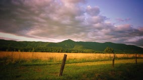 Beautiful landscape with mountain range in Tennessee. Sunlit grass with mountain range stock photo Beautiful landscape with mountain range in Tennessee. Sunlit grass with mountain range stock photo