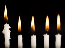 Beautiful lit hanukkah candles on black. stock image Beautiful lit hanukkah candles on black. stock image