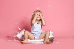Beautiful Little Girl Sitting On Pillow . Studio Shot Stock Images Beautiful Little Girl Sitting On Pillow . Studio Shot Stock Images