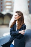 Beautiful lonely woman in city street stock photo Beautiful lonely woman in city street stock photo