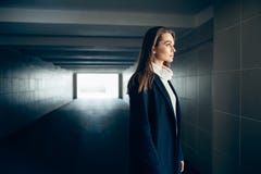 Beautiful lonely woman in a subway tunnel royalty free stock photos Beautiful lonely woman in a subway tunnel royalty free stock photos