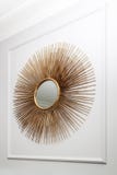 Beautiful Modern Round Mirror In Golden Sun-ray Frame On Wall At Home For Decoration. Decorative Sun Vintage Art Deco Mirror For Royalty Free Stock Photos