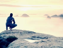 Beautiful Moment The Miracle Of Nature. Colorful Mist In Valley. Man Hike. Person Silhouette Stand Stock Photos Beautiful Moment The Miracle Of Nature. Colorful Mist In Valley. Man Hike. Person Silhouette Stand Stock Photos