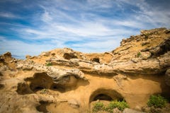Beautiful natural yellow rock formation on atlantic coast in blue sky, biarritz, basque country. France Stock Photos Beautiful natural yellow rock formation on atlantic coast in blue sky, biarritz, basque country. France Stock Photos