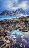 Beautiful Norway landscape of picturesque arctic beach in cold Norwegian Sea Royalty Free Stock Images Beautiful Norway landscape of picturesque arctic beach in cold Norwegian Sea Royalty Free Stock Images