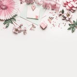Beautiful Pastel Pink Work Space With Flowers Decoration,ribbon, Hearts, Bow And Card Mock Up On White Desk Background, Top View Stock Images Beautiful Pastel Pink Work Space With Flowers Decoration,ribbon, Hearts, Bow And Card Mock Up On White Desk Background, Top View Stock Images