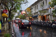 Beautiful reflection on Braga Street at Bandung, Indonesia during rainy day late evening